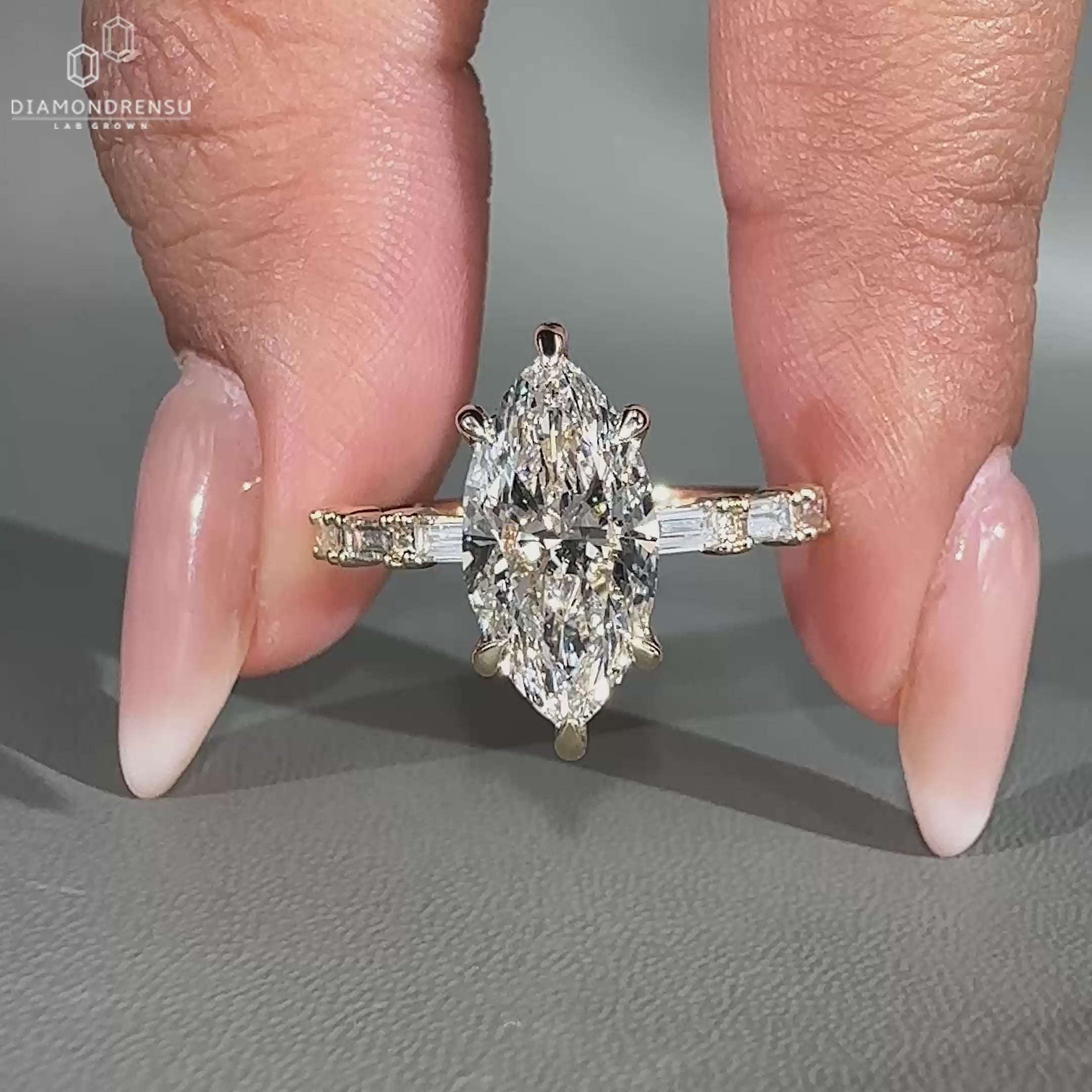 Marquise diamond ring with baguette diamond ring accents.

