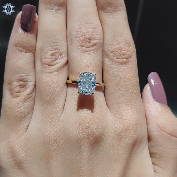 Handmade jewellery crafted with an elongated cushion cut moissanite.
