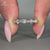 Round diamond eternity band in white gold