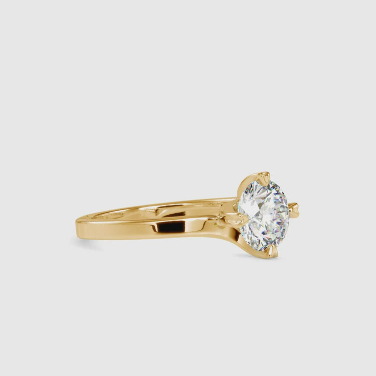 Diamond engagement ring in gold with custom setting.
