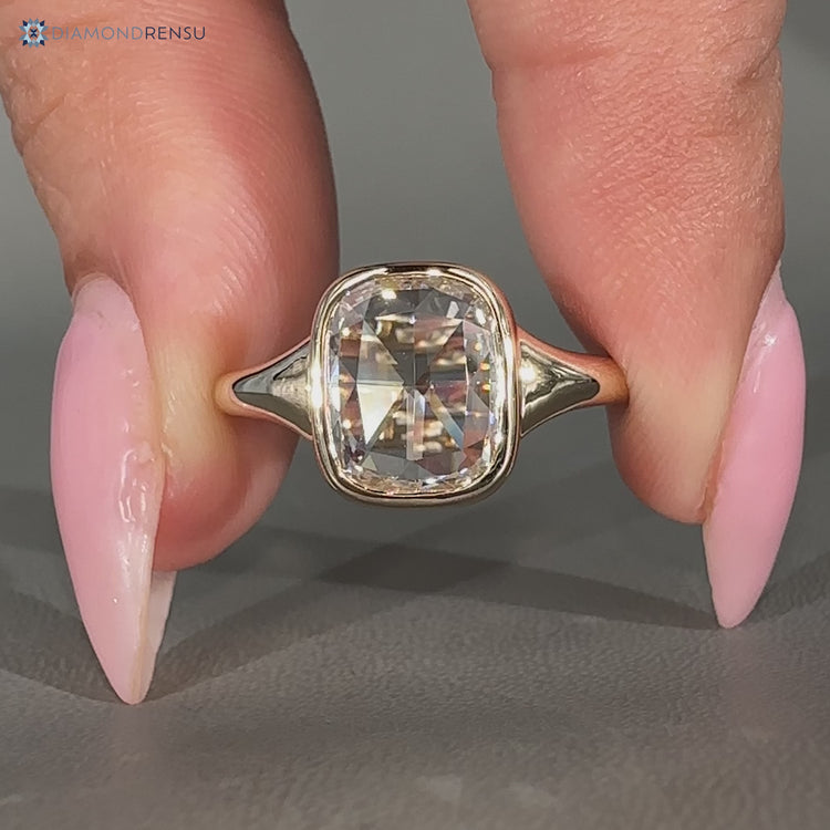 Cushion rose cut diamond ring with solitaire style.