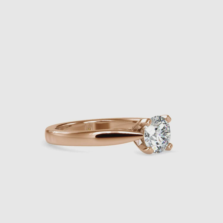 White gold ring with handmade round brilliant cut solitaire.
