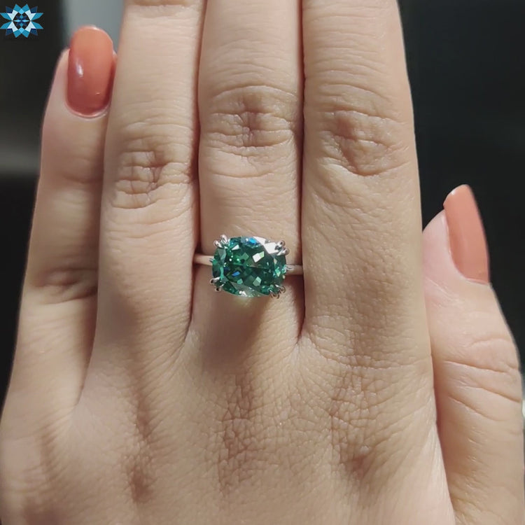 White gold cushion cut moissanite solitaire.
