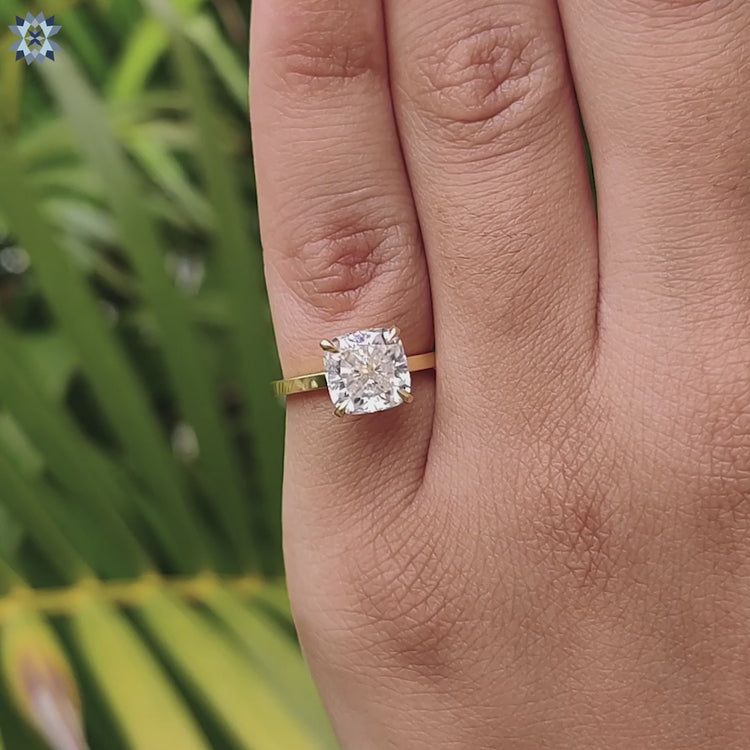 Diamondrensu UK ring with cushion cut moissanite and minimalist setting.
