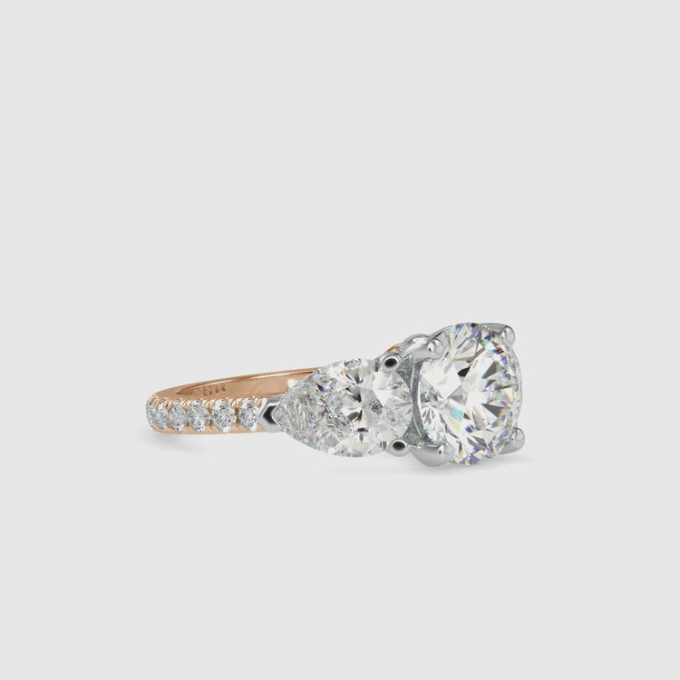 Diamondrensu UK ring with hidden halo and side stones.
