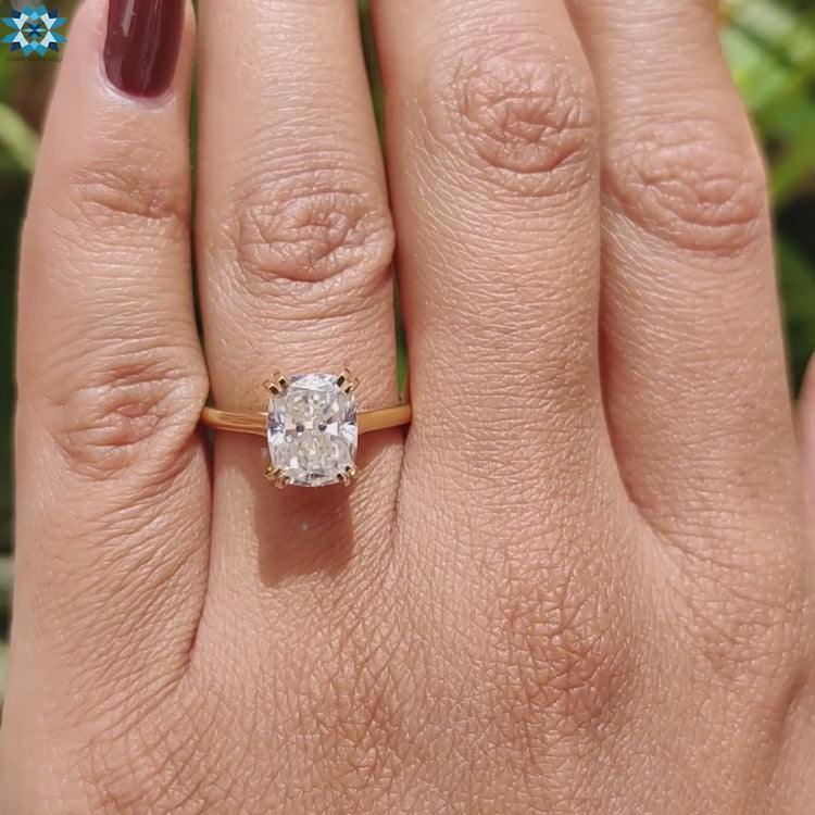 Cushion cut solitaire ring UK.
