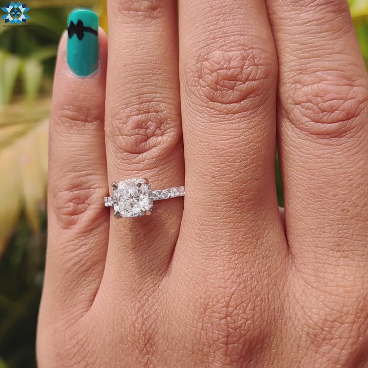 Handmade jewellery featuring cushion moissanite center.
