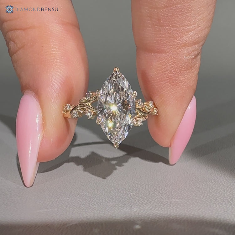 Nature inspired ring with hidden blue round gemstone.