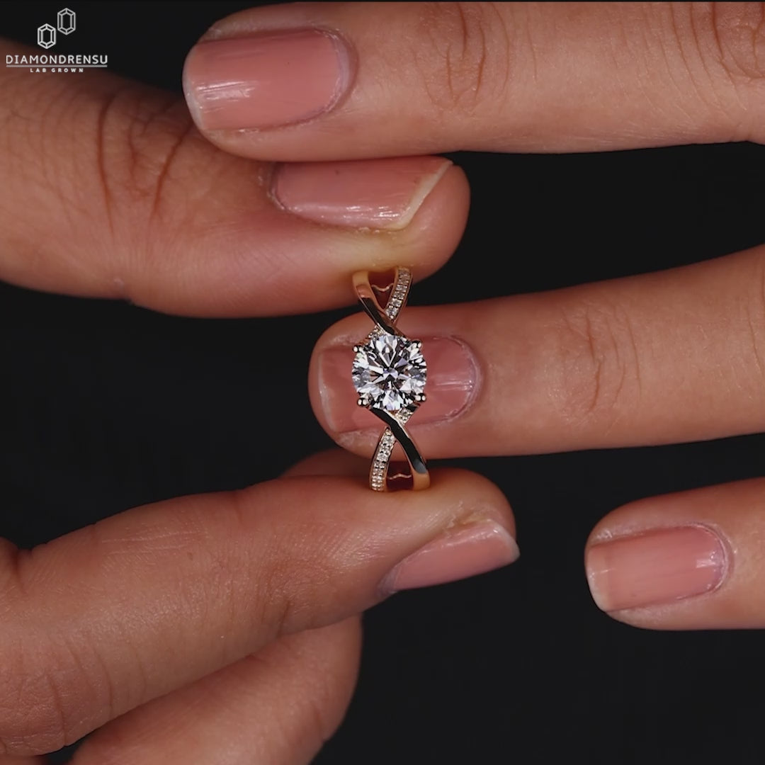Lab diamond ring with round cut pave band.
