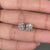 Round diamond earrings crafted as yellow gold studs with secure prong setting.