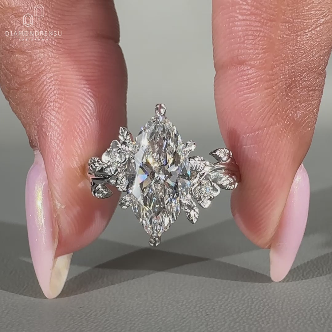 Marquise diamond ring set in white gold.
