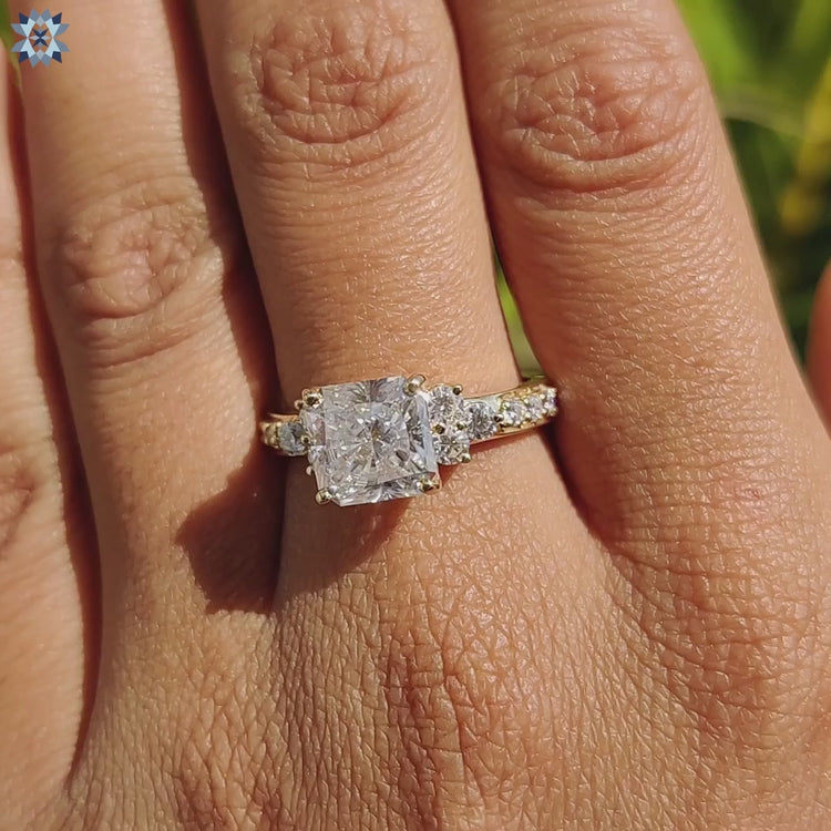 Handmade jewelry with radiant cut moissanite and yellow gold.

