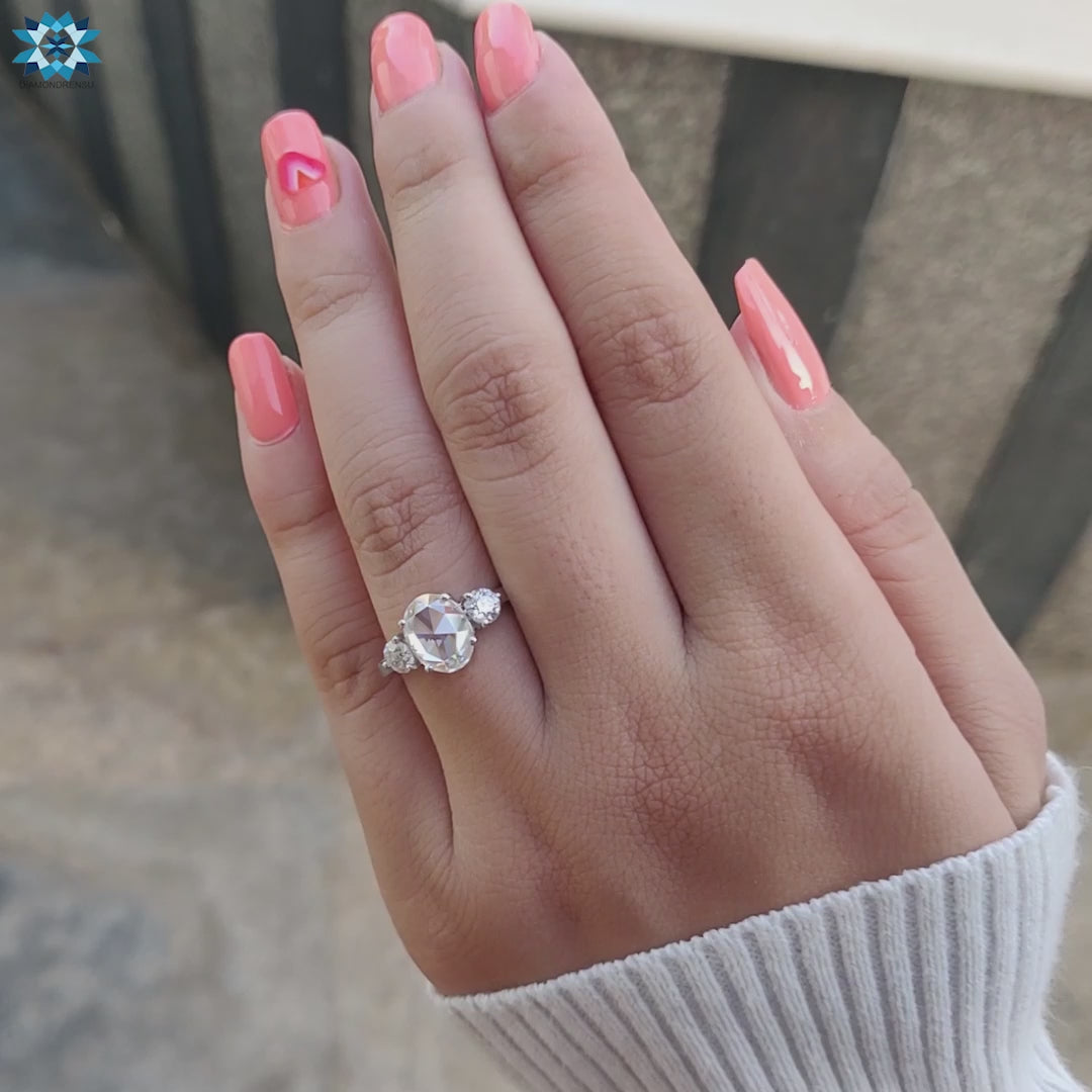 Unique engagement ring featuring an oval shaped center stone for distinct style.
