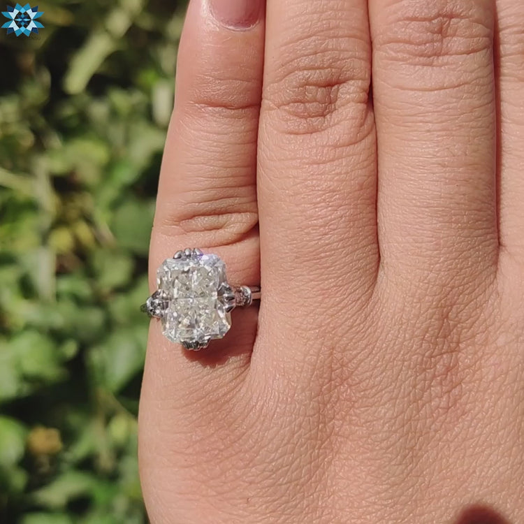Buy moissanite ring with radiant cut and handcrafted setting.
