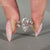 Nature inspired marquise ring with cluster style setting