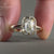 Emerald diamond ring is used as the main centrepiece.
