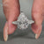 Pear center diamond ring with vintage style and milgrain setting ring.
