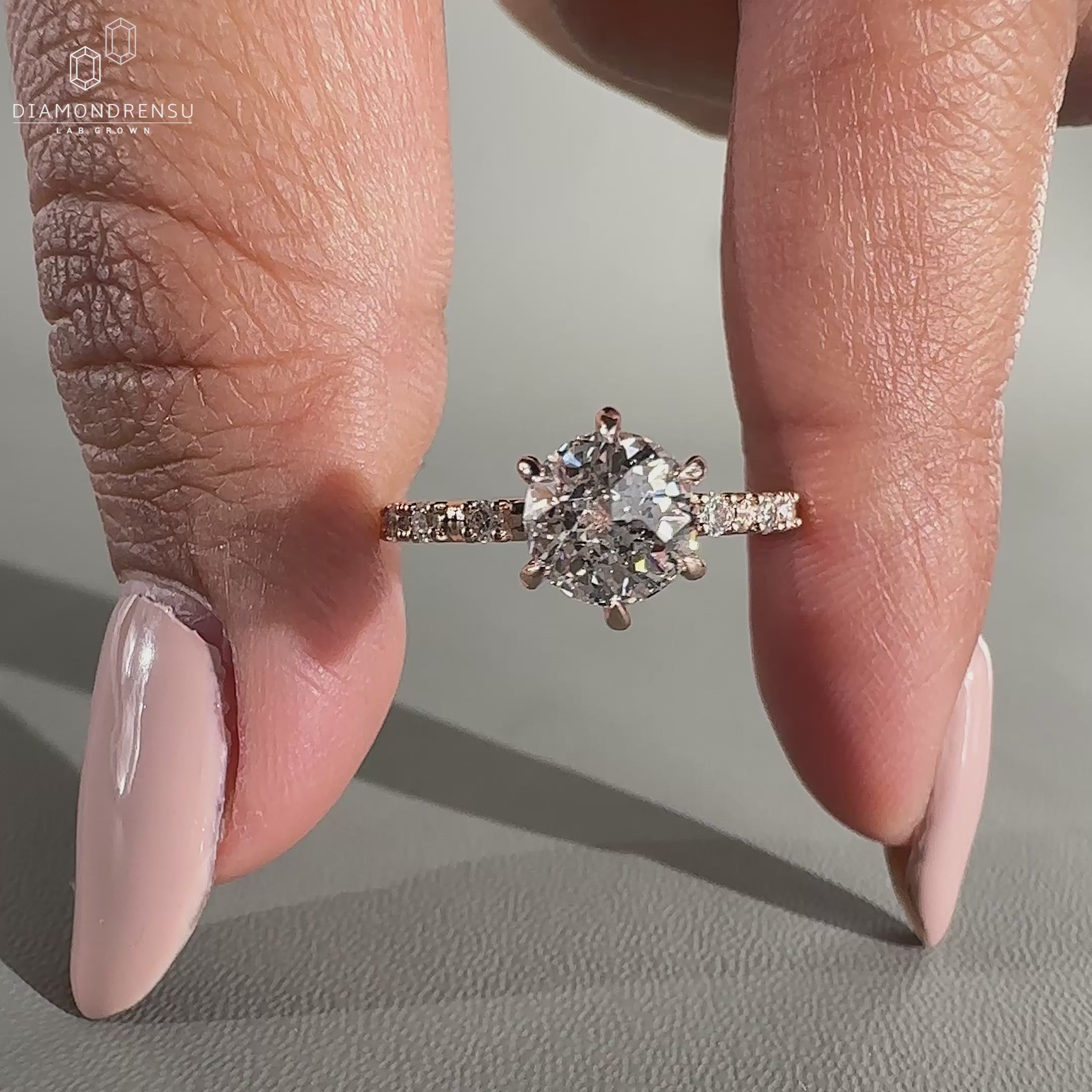 Handmade ring featuring a 6 prong setting and jubilee cut diamond.
