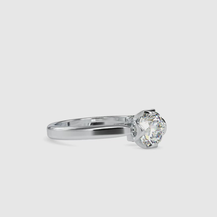Buy engagement ring with peekaboo accent and secure cathedral setting.
