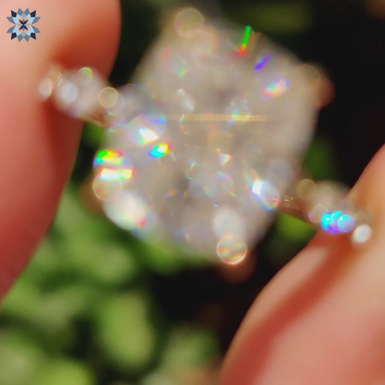 Yellow gold engagement ring featuring round cut hidden halo and 4 prong setting.
