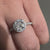 Handcrafted pave engagement ring with a secure prong setting.