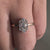 Baguette and Round Cut Diamond Cluster Halo Engagement Ring