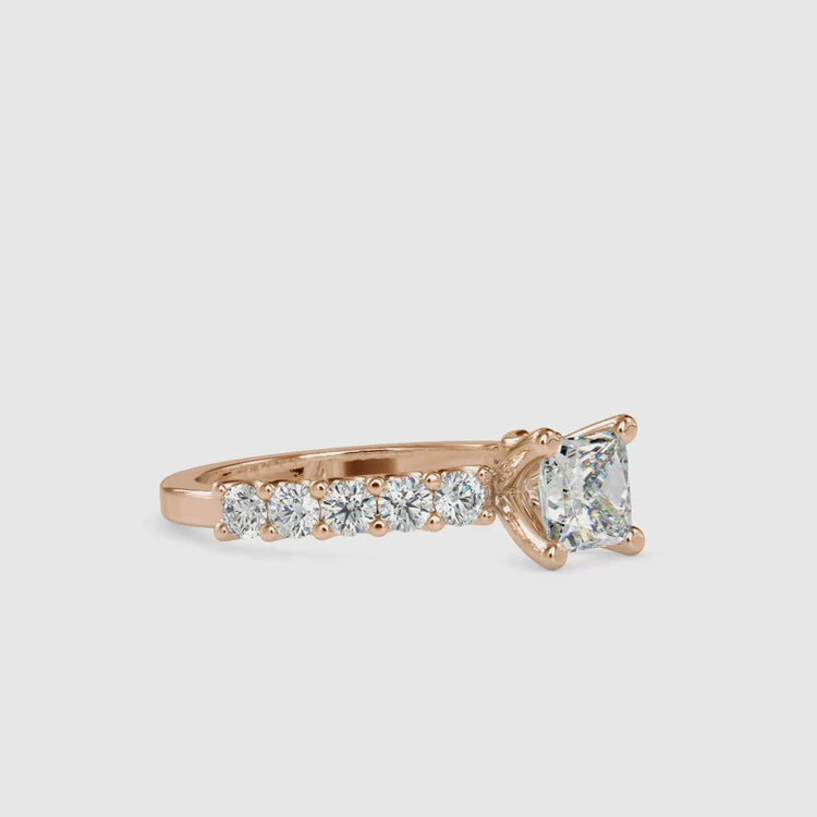 Elegant white gold ring with princess cut diamond and prong setting.
