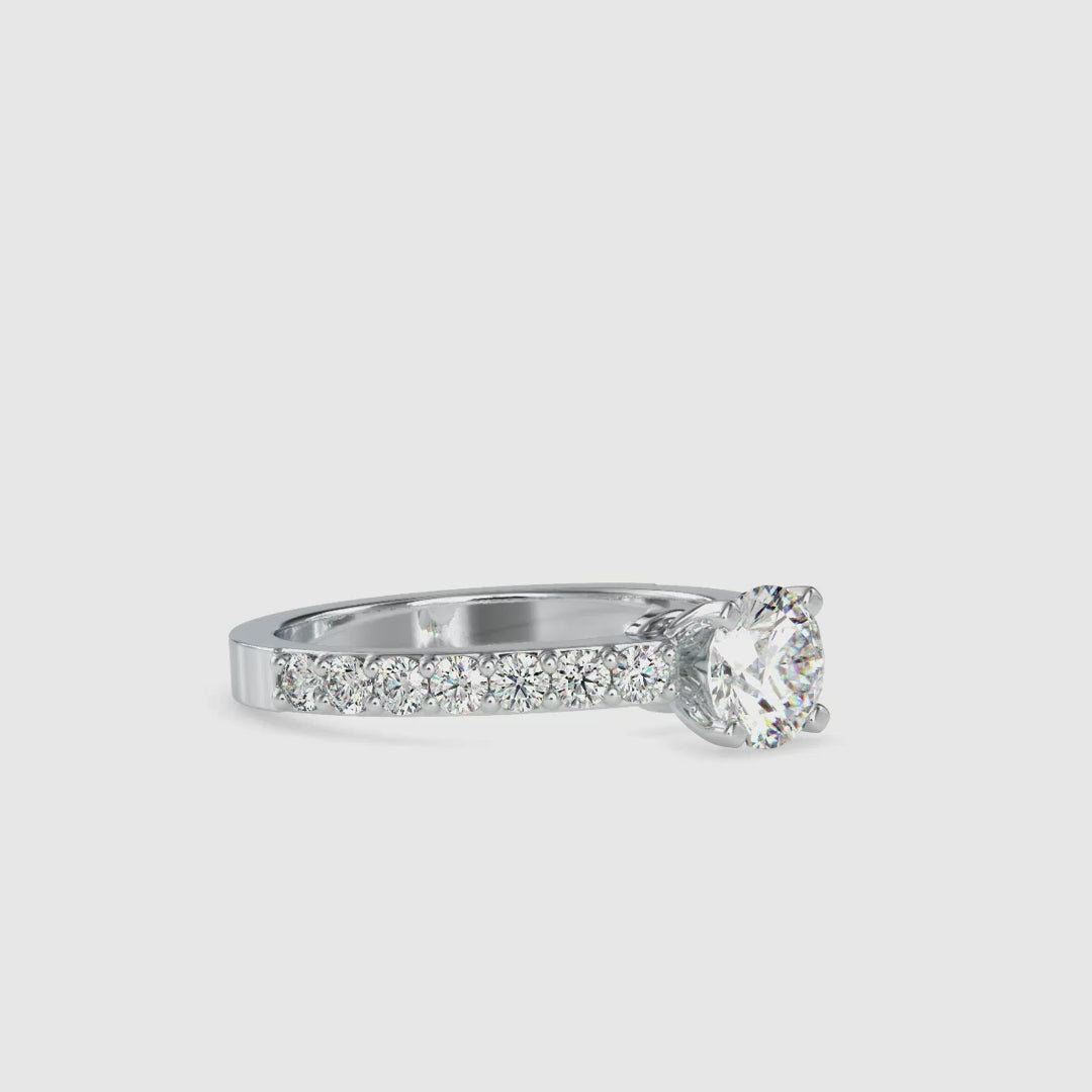 Engagement ring with pave detailing and IGI certified stone.