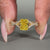 Radiant cut engagement ring designed in yellow gold ring style.
