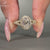 Oval lab diamond ring with pave split shank setting.