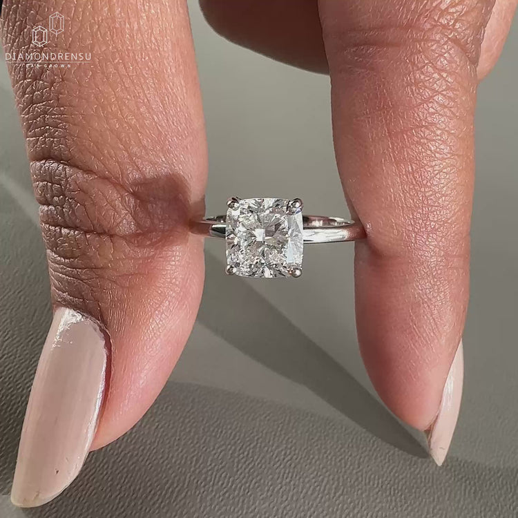 Handmade ring featuring a 4 prong ring setting in white gold.
