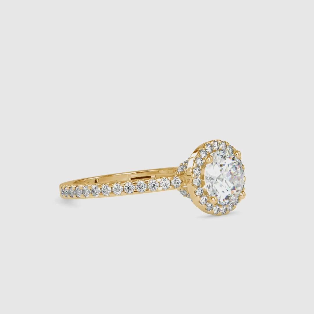 Elegant engagement ring hidden halo style in gold.