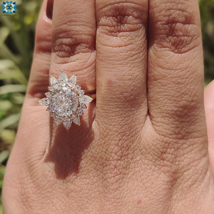 Unique halo engagement ring in yellow gold.
