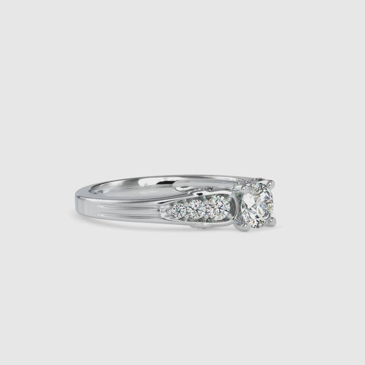 Brilliant cut diamond set in custom 7 stone rose gold ring.