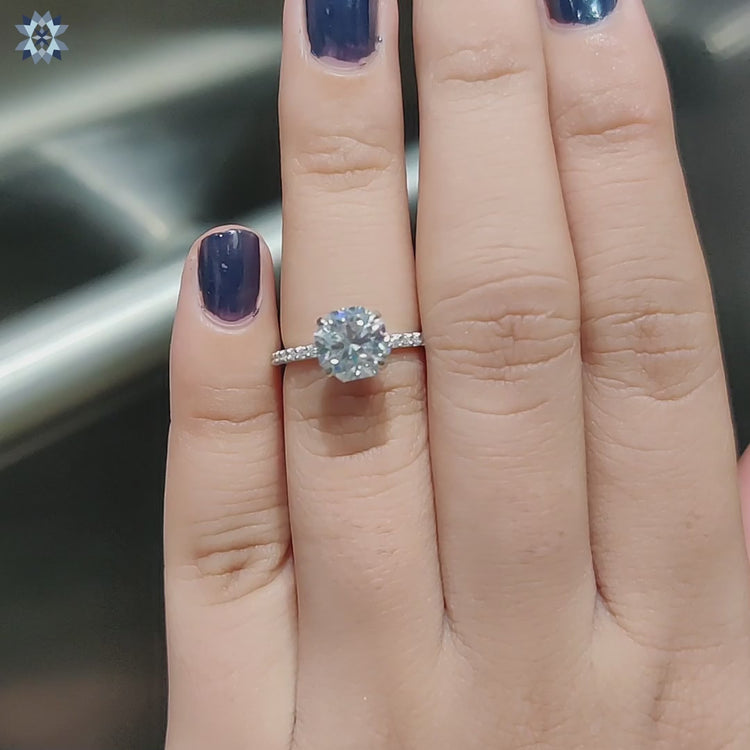 Octagon engagement ring with moissanite and pave design.
