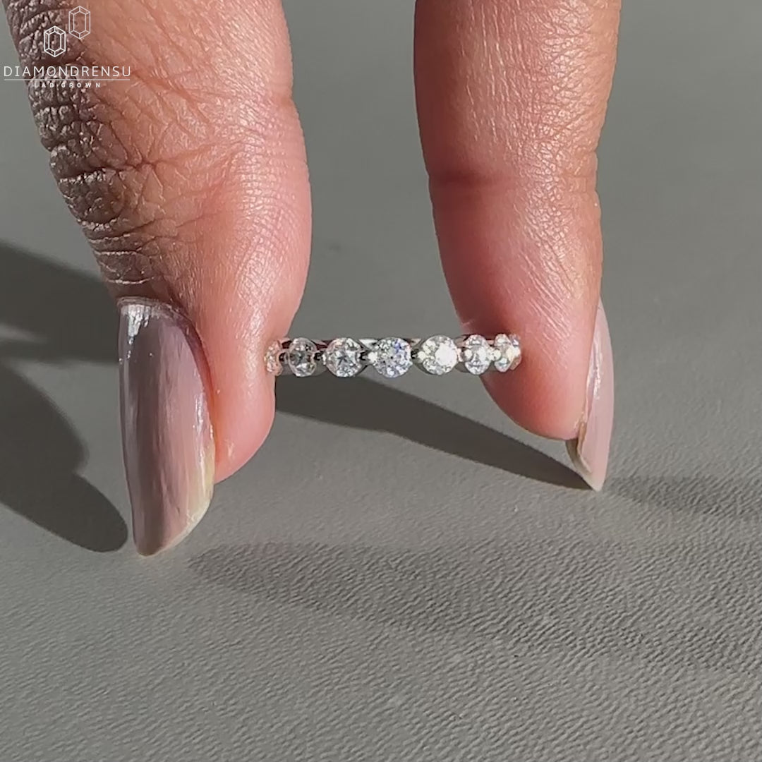 Half eternity wedding band in white gold.
