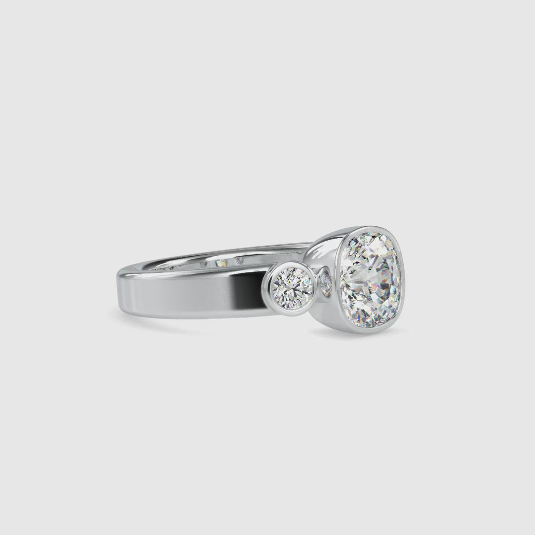 Cushion cut diamond ring with a sleek bezel setting, perfect for modern brides.
