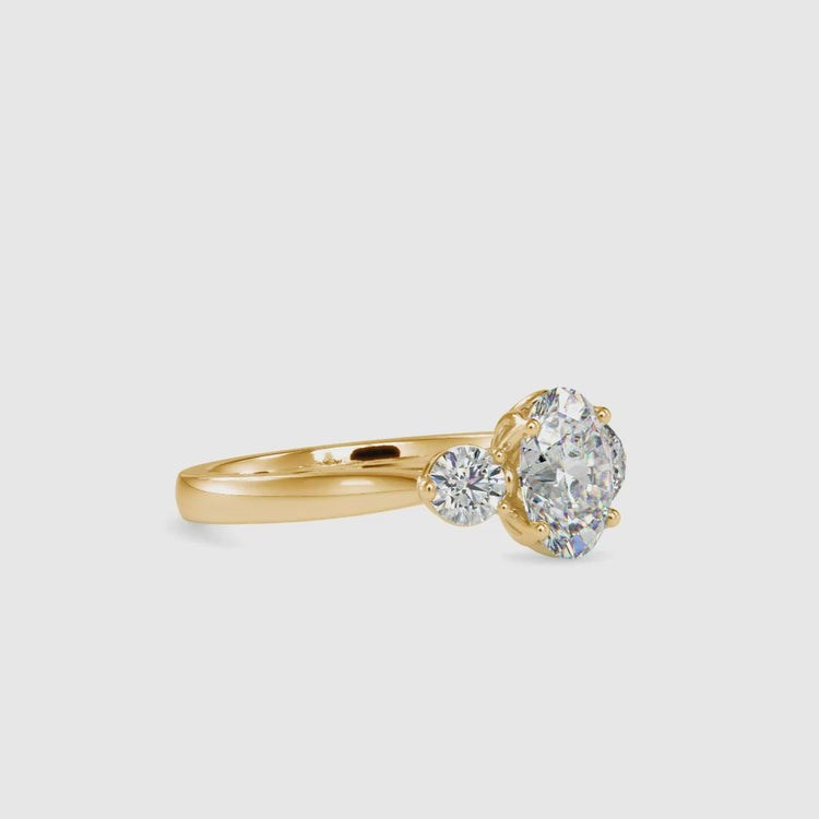 Diamondrensu UK ring with oval centre stone.
