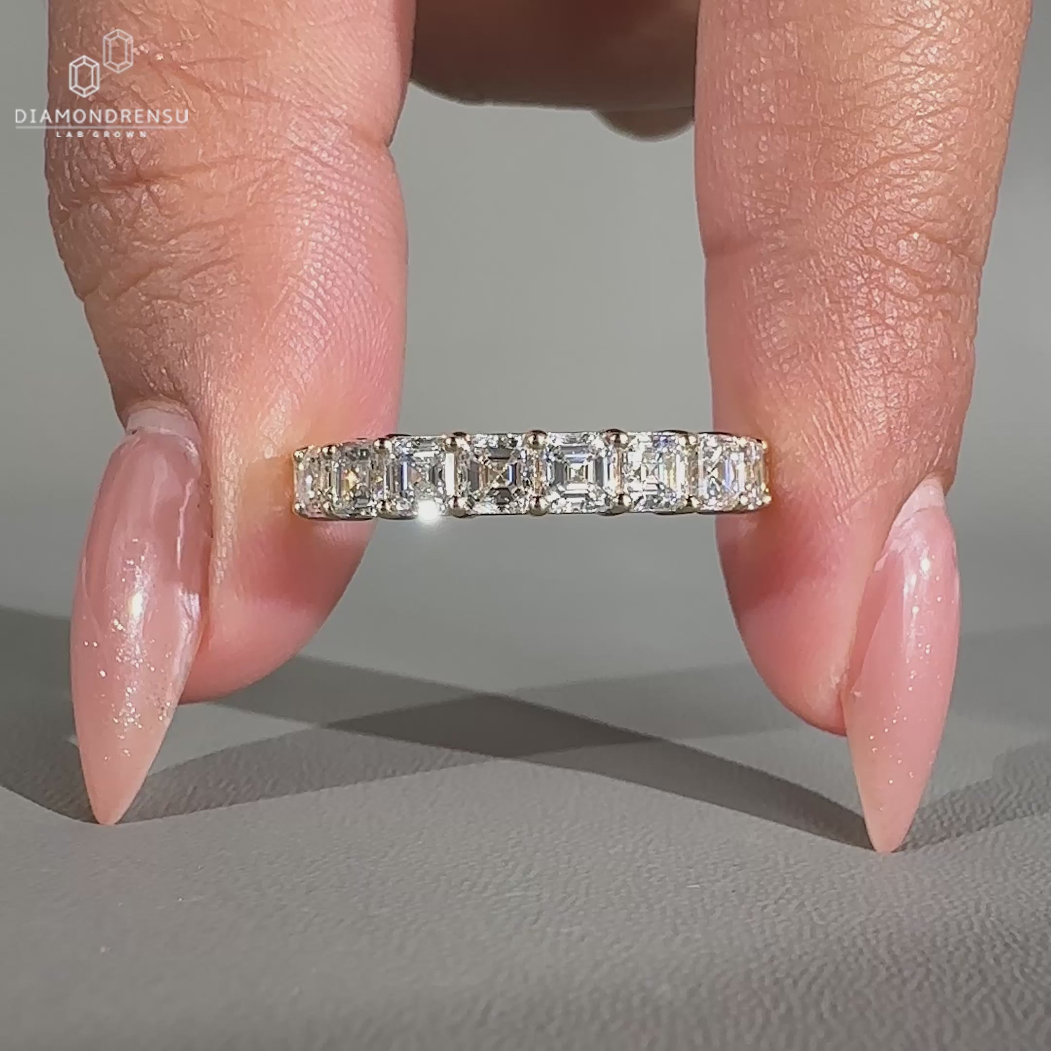Yellow gold half eternity wedding ring.
