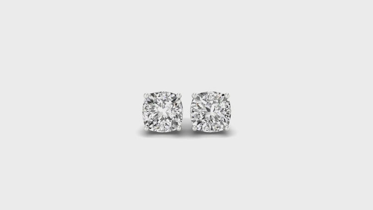 UK diamond earrings made using handmade methods.

