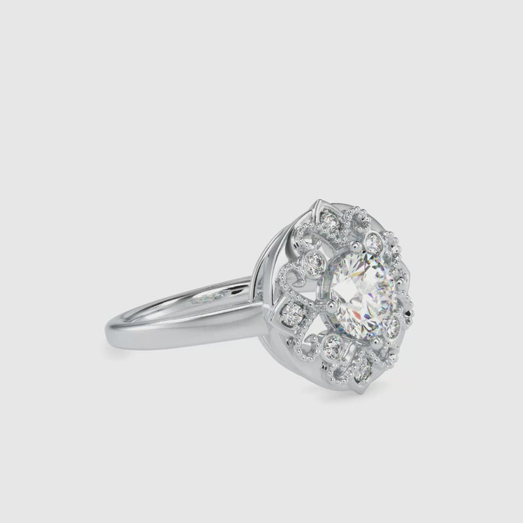 White gold Art Deco ring with IGI certified round cut centre.
