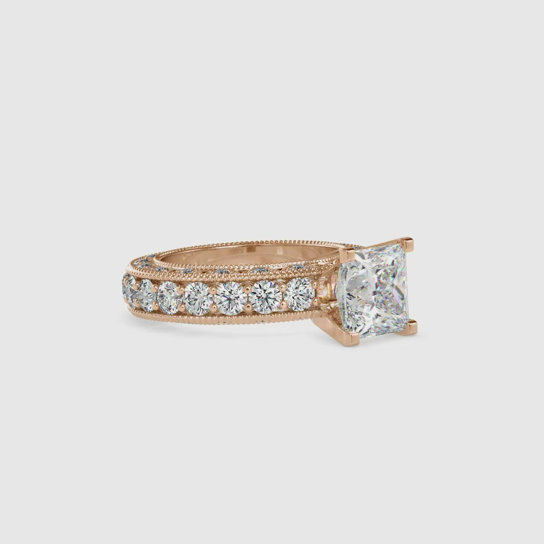 Elegant princess cut diamond ring with a two-carat center stone.
