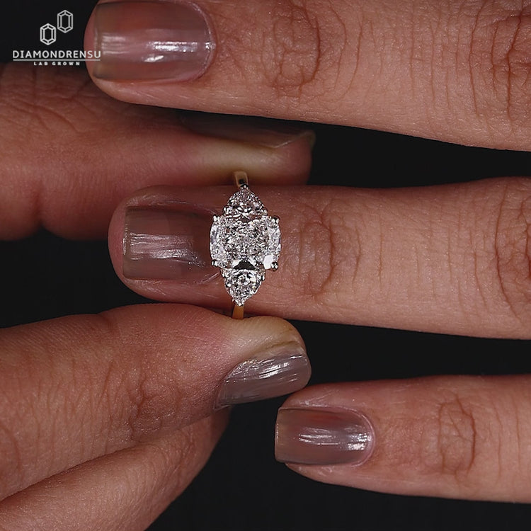 3 stone diamond ring featuring 4 prong ring
