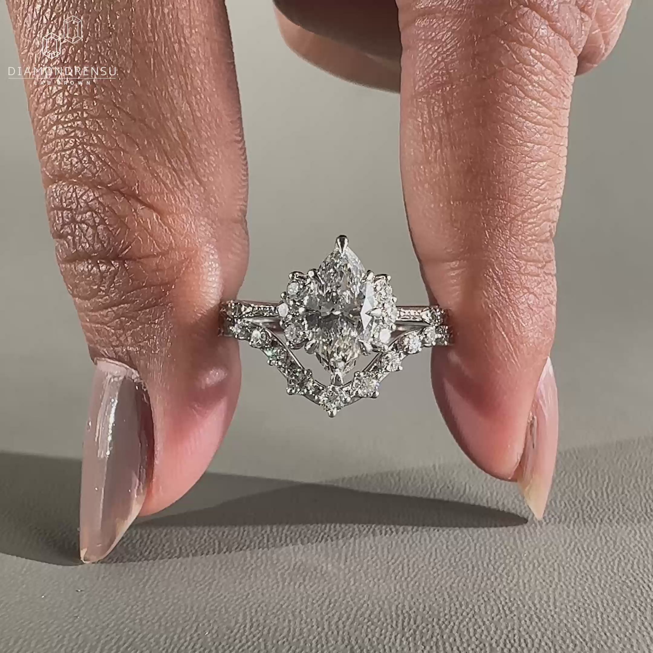 Marquise diamond ring with vintage engagement ring design.
