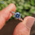 Round cut moissanite ring with a classic 6 prong setting in white gold.
