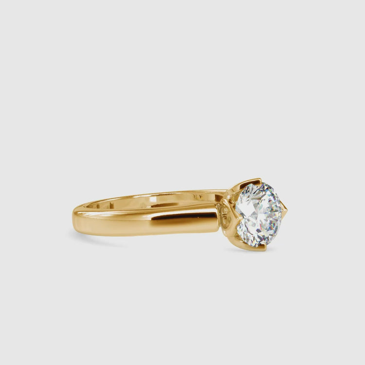 Diamondrensu UK engagement ring with tulip setting and round diamond.
