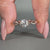 Round diamond solitaire ring with hidden heart setting and hart shape prong set.
