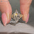 Handmade marquise ring with art deco style details.