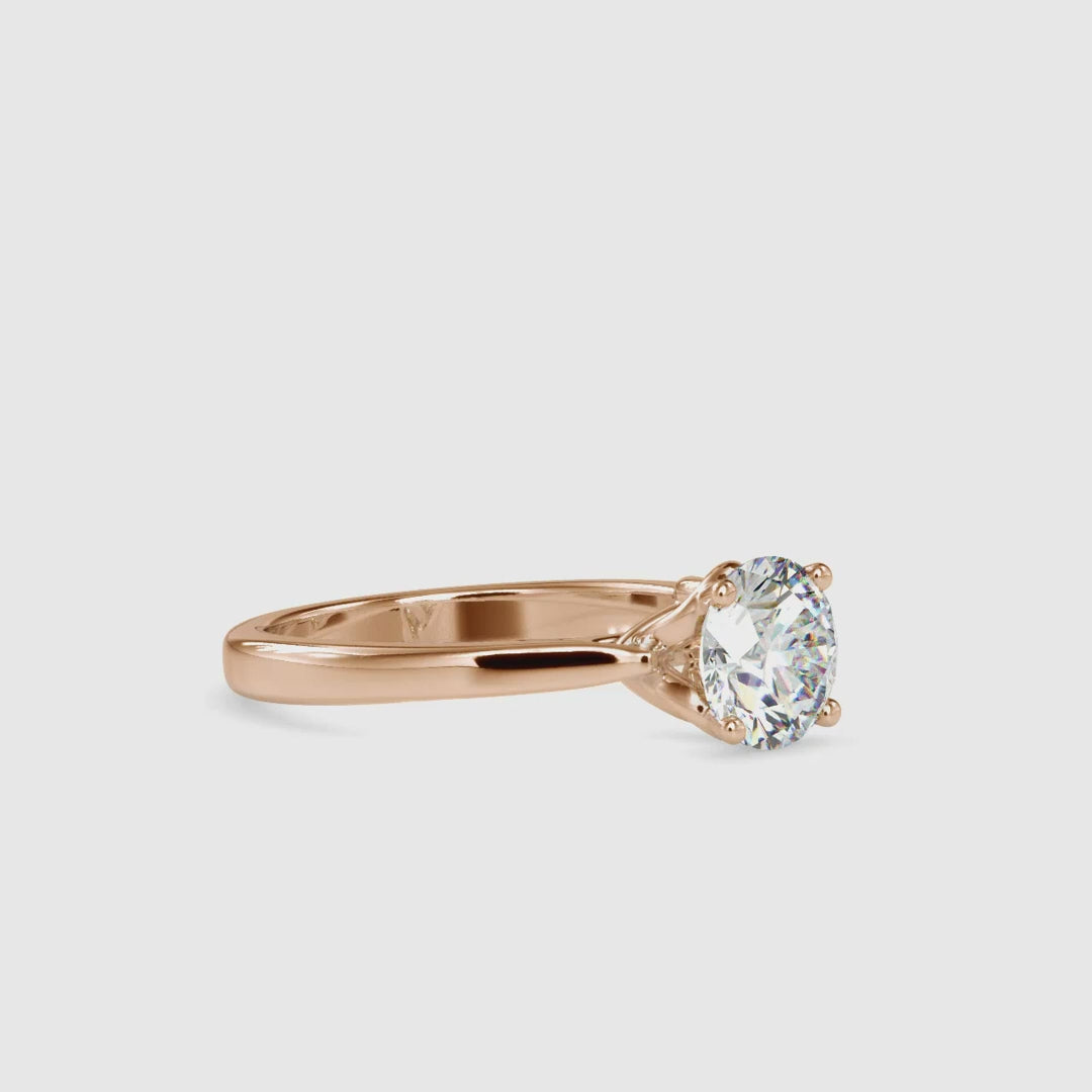 Solitaire Engagement Ring Twisted Basket featuring a round diamond for a timeless look.