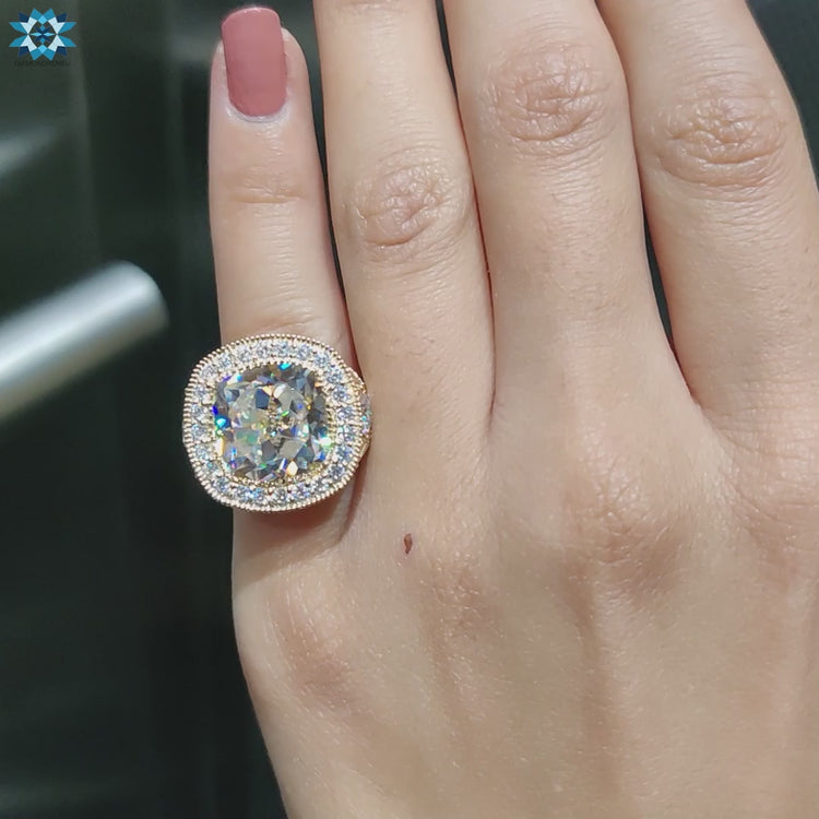 Diamondrensu UK handmade cushion cut engagement ring.
